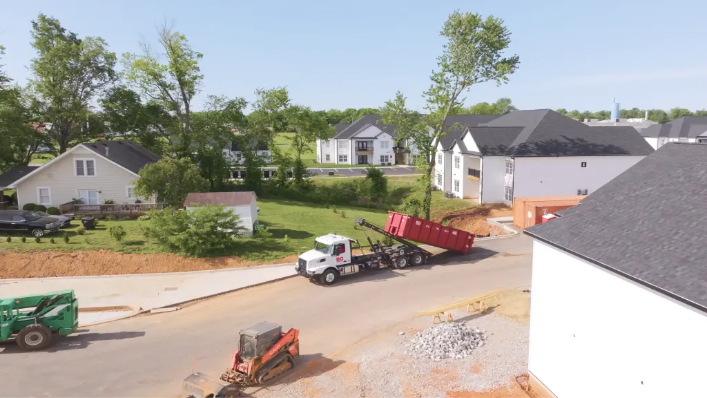 BG Dumpster roll-off container at a residential jobsite